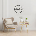 Mot smile manuscrit dans un cercle, déco murale en métal noir