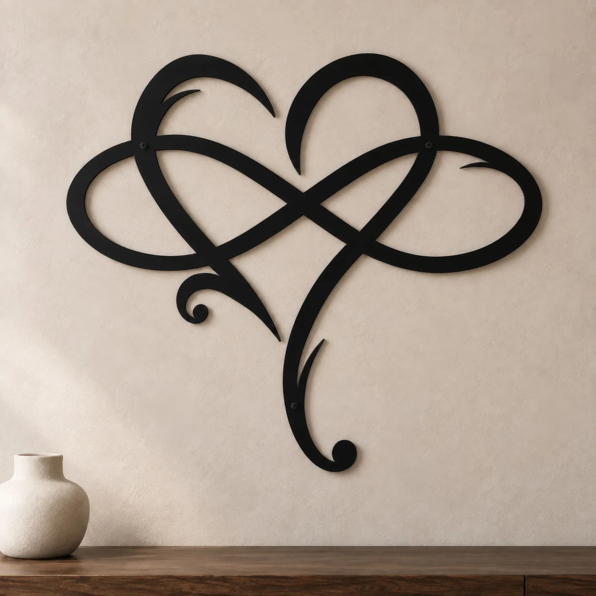 Cœur entrelacé avec le symbole infini en métal noir
